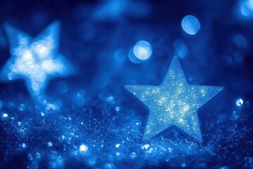 Obraz premium Luminous Blue Stars and Bokeh Festive Background.