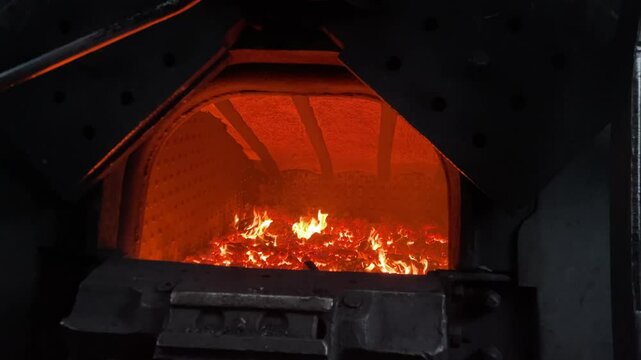 steam locomotive open firebox with hot roaring fire in the engine showcasing vintage railway power