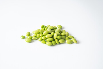 fresh edamame beans on white background