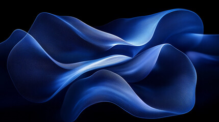 Obraz premium Waves of blue fabric flowing gracefully against a dark backdrop in an artistic display