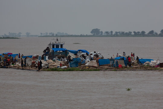 The Main Road Through the Heart of Africa Is the Congo River. Passengers travel by overloaded freight barges on 1,000-mile journeys that can take months.
