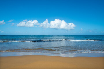 Cyprus Alagadi Turtle Beach. View from the beach to the sea. Magnificent beach, sea and blue cloudy sky. Yellow sand beach. Beach and blue sky.