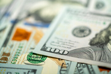 Close-up view of various denominations of cash on a flat surface