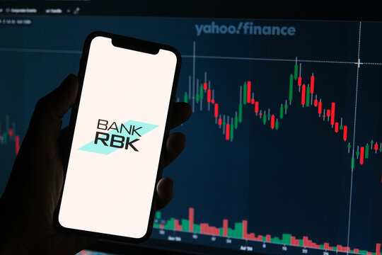 Moscow, Russia &mdash; 11.19.2024: the RBK bank's logo on the background of the stock market chart