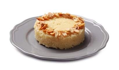 Delicious semolina halva with almond flakes isolated on white