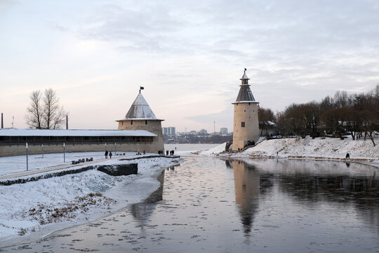 PSKOV, RUSSIA &mdash; January, 2025: The center of Pskov, a Ploskaya bashnya tower, a Vysokaya bashnya tower between them is the Pskov River, which flows into the Velikaya River
