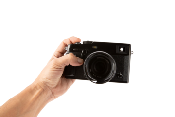 Male hand holding a telemetric digital photo camera isolated no background cutout.