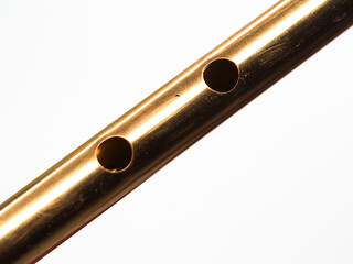 Holes on a tin whistle
