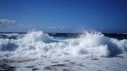 Obraz premium Powerful Ocean Waves Crashing Against Coastline Under Sunny Blue Sky : Generative AI