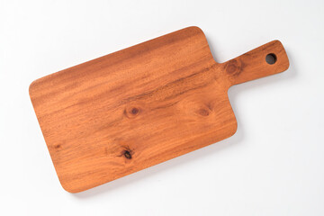Wooden cutting board, isolated on white background. Flat lay top view