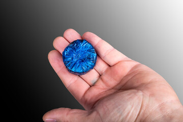 Studio lighting. bathroom. Toilet bowl. The housewife adds a special cleaning and disinfection agent to the barrels.