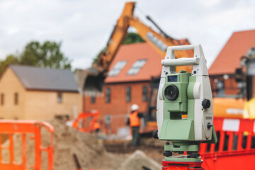 Close-up of surveying equipment set on construction site by land surveyor for measurments