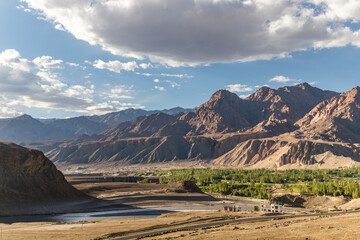 Himalayan mountain view at Nimmoo village in Ladakh, passing through the Zanskar Valley Road in Ladakh, India.