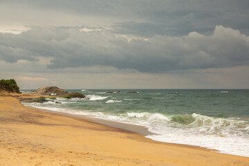 The beautiful beach on the coast of the Indian Ocean in Sri Lanka.