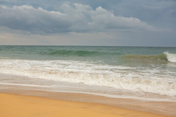 The beautiful beach on the coast of the Indian Ocean in Sri Lanka.