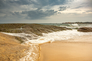 The beautiful beach on the coast of the Indian Ocean in Sri Lanka.