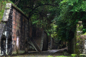 Historic old fortress hidden in the forest, build in stone brick wall, in Gongziliao Fortification, in Keelung City, Taiwan.