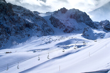 View of the Shymbulak ski resort in the Trans-Ili Alatau Mountains, Kazakhstan. Shymbulak is a ski resort near the city of Almaty, Kazakhstan. It is the largest ski resort in Central Asia.