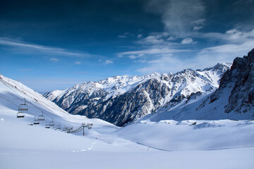 View of the Shymbulak ski resort in the Trans-Ili Alatau Mountains, Kazakhstan. Shymbulak is a ski resort near the city of Almaty, Kazakhstan. It is the largest ski resort in Central Asia.