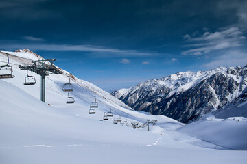 View of the Shymbulak ski resort in the Trans-Ili Alatau Mountains, Kazakhstan. Shymbulak is a ski resort near the city of Almaty, Kazakhstan. It is the largest ski resort in Central Asia.
