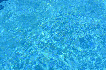 Water in swimming pool, background