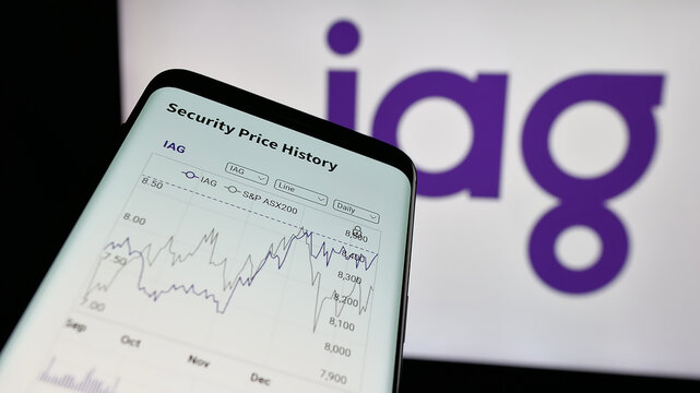 Stuttgart, Germany - 01-22-2025: Mobile phone with website of company Insurance Australia Group Limited (IAG) on screen in front of business logo. Focus on top-left of phone display.