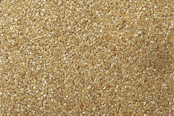 Close-up of fine, golden sand texture.