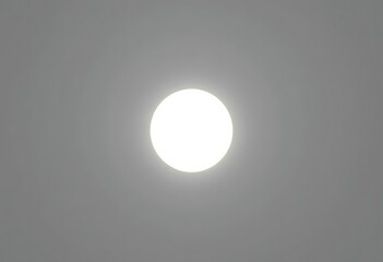 Bright White Sun In Gray Sky