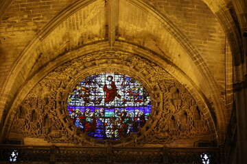 The stained glass window in the Cathedral of Seville, Andalusia, Spain    