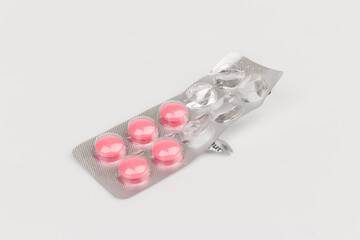 Used pill blister pack isolated on white background