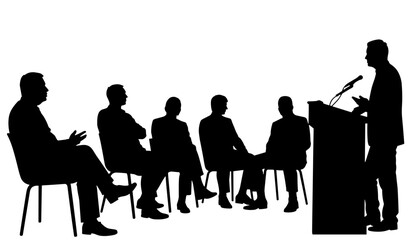 Speaker addressing audience silhouettes in a formal setting