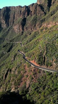 Vertical drone shot Landscape of the Masca valley at sunset in Tenerife, Canary island, Spain. Scenic mountain landscape road
