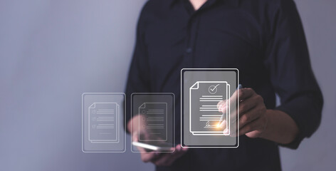 Young man with smartphone mobile hand using a pen touching to sign a Online Business Contract, Electronic signature, Contract signing, Digital documents, Future smart contract