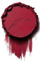 Swatch of dark red lipstick.
