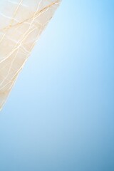 top down view of luxurious marble textures in soft gradient tones forming base for elegant high-end packaging designs