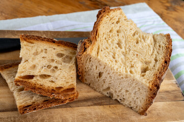 Freshly baked big sourdough traditional italian bread on olive wood fired oven