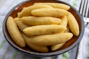 Schupfnudel or Fingernudel, finger noodle, dumpling or thick noodle in German and Austrian cuisine, similar to Central European kopytka and Italian gnocchi