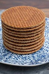 Traditional Dutch sweet dessert, Butter caramel syrup waffles, fresh baked