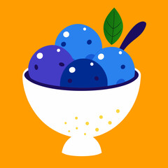Delicious bowl of ice cream topped with fresh blueberries