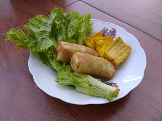 Fried bamboo shoot rolls and tofu