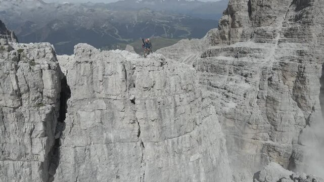 Drone footage of Bocca di Tuckett on Sentiero Alfredo Benini and Sentiero delle Bocchette Alte in Brenta Dolomites, showcasing limestone peaks, exposed ridges, and alpine landscapes.