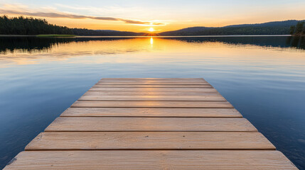 Fototapeta premium calm lake with wooden dock under beautiful sunset sky