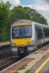 Naklejka premium Passenger diesel train at West Midlands railway station England UK 