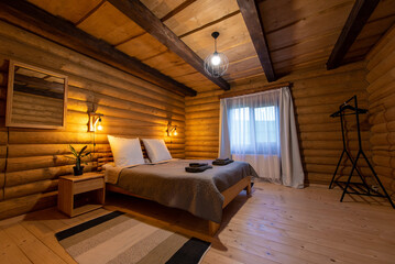 Cozy Log Cabin Bedroom with Wooden Walls