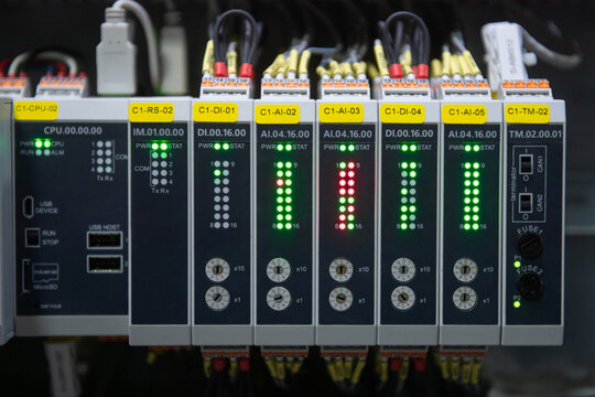 Programmable Logic Controller PLC comprised of analog and digital input and output with power supply and processor module.