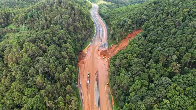 Drone peaks through clouds of Hurricane Helene to reveal devastating mudslide blocking Interstate 40 near Asheville, NC