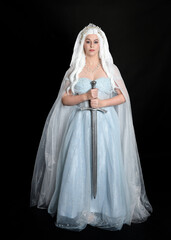 full length portrait beautiful blonde fantasy maiden faery wearing medieval fairytale ballgown...