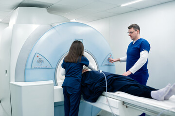 Medical scientific hospital laboratory meeting: Diverse team of neurologists, neuroscientists, neurosurgeons taking MRI, CT scan of patient, Talk About Treatment Method, New Drugs Cure