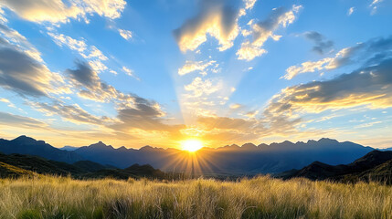 Obraz premium Majestic mountains silhouetted against colorful sunset sky