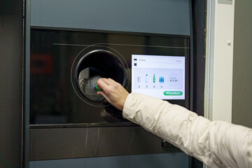 Machine for accepting plastic and aluminum beverage bottles. Ecological recycling of beverage waste.